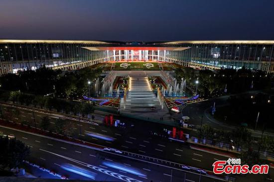 Night illumination of the National Exhibition and Convention Center in Shanghai, Nov.2, 2021. (Photo: China News Service/Yin Liqin)

