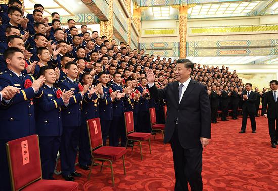 President Xi Jinping meets with representatives of national role models in the field of emergency management and loyal guards in the fire-fighting sector on Nov 5, 2021. (Photo/Xinhua)