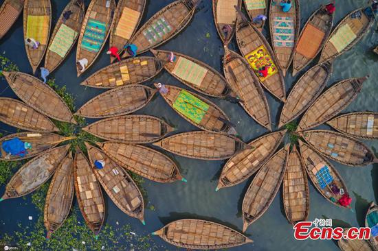 Wooden boats in Bangladesh form floral patterns
