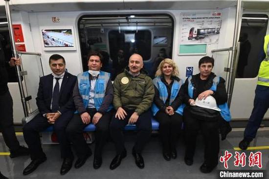 Adil Karaismailolu, minister of Transportation and Infrastructure, sits in the train. (Photo provided by CRRC)