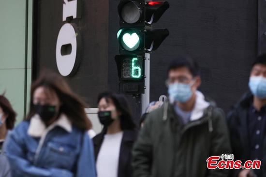 Heart-shaped traffic Light appears on Beijing street