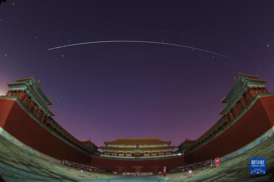 Tiangong space station flies across sky