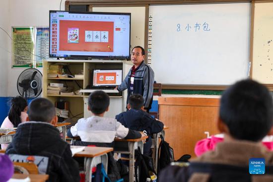 Teacher brothers devoted to rural education in Guangxi