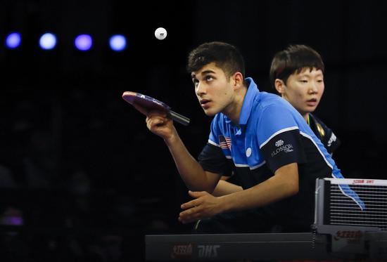 China-U.S. mixed doubles pairs enter 1/8 finals
