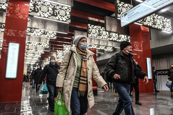 Passengers are seen in the newly opened Michurinsky Prospekt metro station in Moscow, Russia on Dec. 7, 2021. (Xinhua/Evgeny Sinitsyn)