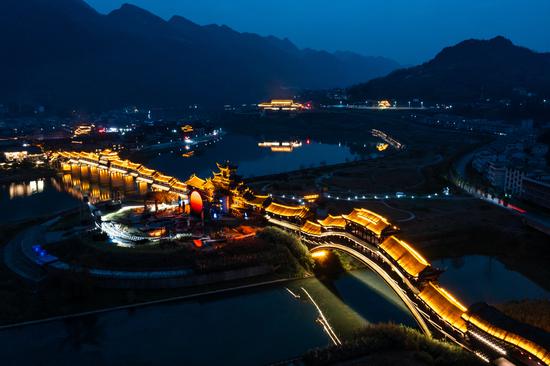 Night scenery of longest covered bridge in Asia