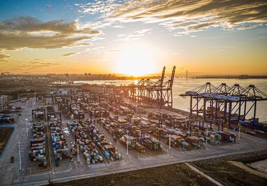 Aerial photo taken on May 26, 2021 shows the Yangpu international container port at Yangpu economic development zone in South China's Hainan province. (Photo/Xinhua)