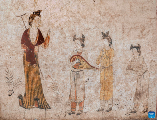 Undated file photo provided by Taiyuan Institute of Cultural Relics Protection shows a part of restored murals of an ancient tomb dating back to the Tang Dynasty (618-907) in Taiyuan, north China's Shanxi Province. The tomb was discovered in an elementary school in Taiyuan, capital of Shanxi, in 2019 and later moved to the museum for protection and restoration.

Defects in the murals such as fissures, hollows and blemishes have been fixed, and the tomb will open to the public in the future, said the Taiyuan Northern Qi Dynasty Mural Museum.

Interestingly, various figures in the mural paintings appear to be making 