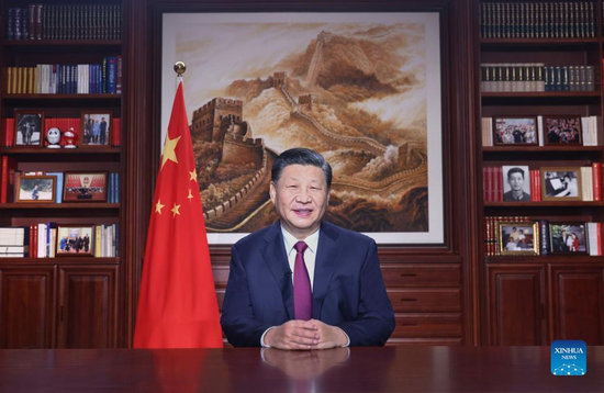 Chinese President Xi Jinping delivers his 2022 New Year Address through China Media Group and the Internet on New Year's eve. (Xinhua/Ju Peng)