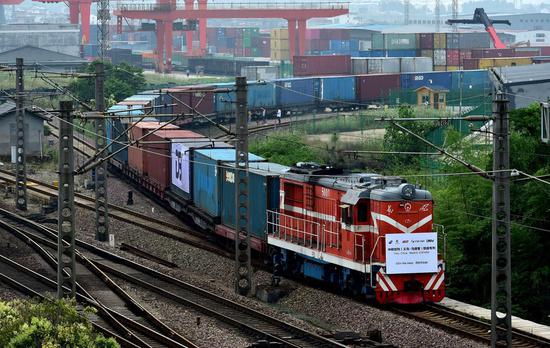 A China-Europe freight train carrying medical supplies bound for Madrid of Spain departs from the city of Yiwu, east China's Zhejiang Province, June 5, 2020. (Photo by Lyu Bin/Xinhua)