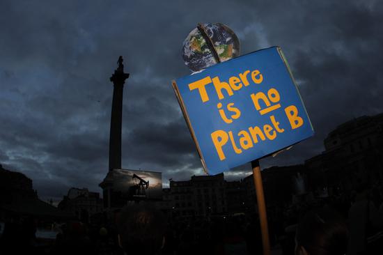 Demonstrators gather in Trafalgar Square following a march as part of the Global Day of Action for Climate Justice in London, Britain, Nov. 6, 2021. (Photo by Tim Ireland/Xinhua)