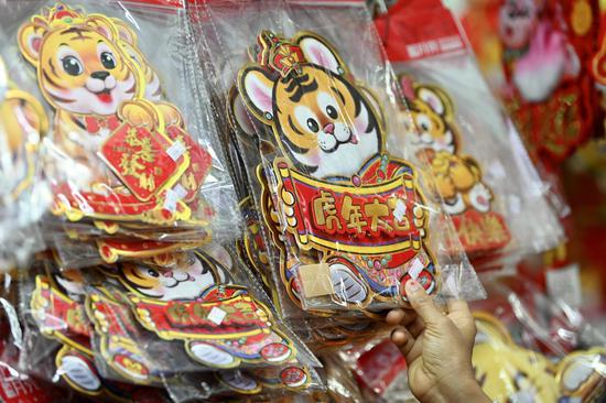 Hong Kong people buy decorations for Chinese New Year
