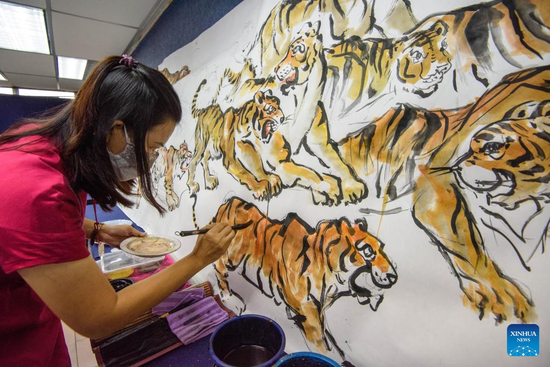 Tiger paintings created to welcome upcoming Chinese new year in Malaysia
