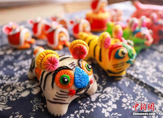 Tiger-shaped buns popular as Chinese New Year draws near