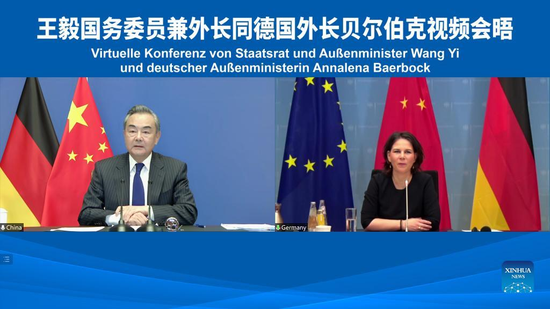 Chinese State Councilor and Foreign Minister Wang Yi holds talks with German Foreign Minister Annalena Baerbock via video link on Jan. 20, 2022. (Xinhua)