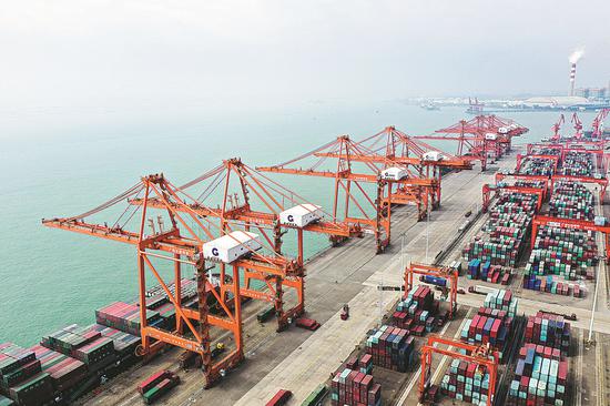 An aerial view of the container dock of the Qinzhou Port section of China (Guangxi) Pilot Free Trade Zone in Qinzhou, South China's Guangxi Zhuang autonomous region. (Photo/Xinhua)