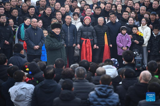 Chinese President Xi Jinping, also general secretary of the Communist Party of China (CPC) Central Committee and chairman of the Central Military Commission, talks with villagers in Duancun Village, Sengnian Township of Fenxi County, north China's Shanxi Province, Jan. 26, 2022. Xi on Wednesday began his visit to Shanxi Province ahead of the Spring Festival, or the Chinese New Year. (Xinhua/Yan Yan)