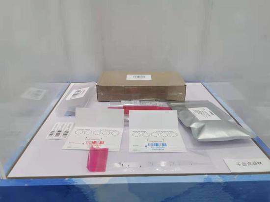 The dried blood spot (DBS) testing kit was displayed in 11th China's National Games held in Shaanxi, China. (Xinhua/Ma Xiangfei)