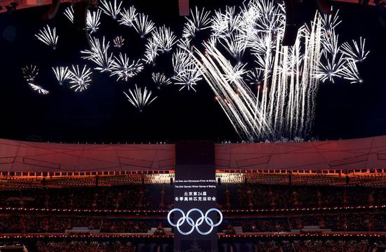 Fireworks illuminate the night sky during the opening ceremony of the Beijing 2022 Olympic Winter Games at the National Stadium in Beijing on Feb. 4, 2022. (Xinhua/Chen Jianli)