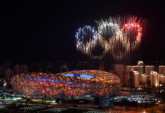 Fireworks illuminate the night sky during the opening ceremony of the Beijing 2022 Olympic Winter Games at the National Stadium in Beijing, Feb. 4, 2022. (Xinhua/Li Xin)