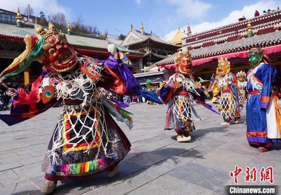 Monks perform religious dance 'Tiaoqian' in Qinghai