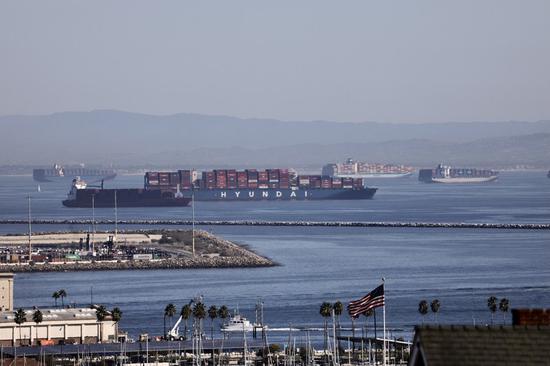 Container ships are seen waiting outside the port of Los Angeles, California, the United States, Oct. 29, 2021. (Xinhua)