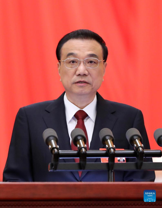 Chinese Premier Li Keqiang delivers a government work report at the opening meeting of the fifth session of the 13th National People's Congress at the Great Hall of the People in Beijing, capital of China, March 5, 2022. (Xinhua/Yao Dawei)