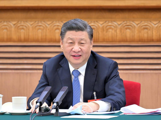 Chinese President Xi Jinping, also general secretary of the Communist Party of China Central Committee and chairman of the Central Military Commission, takes part in a deliberation with his fellow deputies from the delegation of Inner Mongolia Autonomous Region, at the fifth session of the 13th National People's Congress (NPC) in Beijing, capital of China, March 5, 2022. (Xinhua/Li Tao)