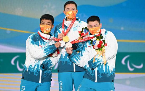 China's Paralympic debutants savor podium sweep in snowboard cross