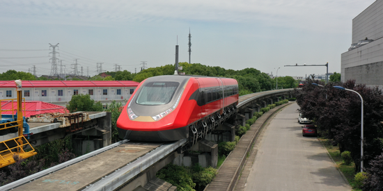 Photo provided by CRRC Zhuzhou Locomotive Co., Ltd. shows the company's next generation of commercial maglev train in  dynamic testing on June 21, 2021. (CRRC Zhuzhou Locomotive Co., Ltd./Handout via Xinhua)