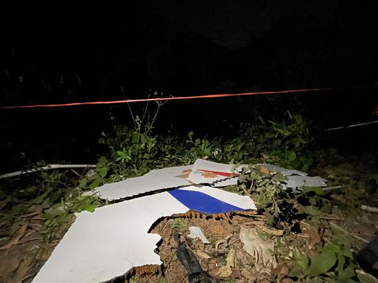A photo taken on March 22, 2022, shows debris found at the site where a China Eastern Airlines aircraft carrying 132 people crashed in Southern China's Guangxi Zhuang autonomous region on Monday afternoon. (Photo/Xinhua)