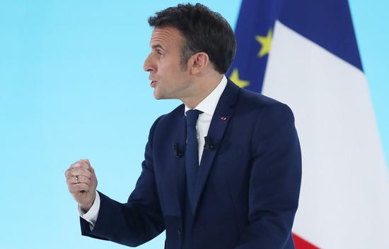 French President Emmanuel Macron delivers a speech at a rally after the first round of French presidential election in Paris, France, on April 10, 2022.  (Xinhua/Gao Jing)