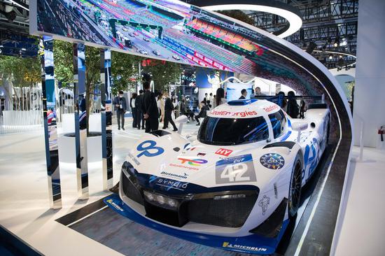 Photo taken on Nov. 7, 2021 shows a Mission H24 hydrogen racing car displayed at Michelin booth of the Automobile Exhibition Area of the 4th China International Import Expo (CIIE) in east China's Shanghai (Xinhua/Meng Tao)