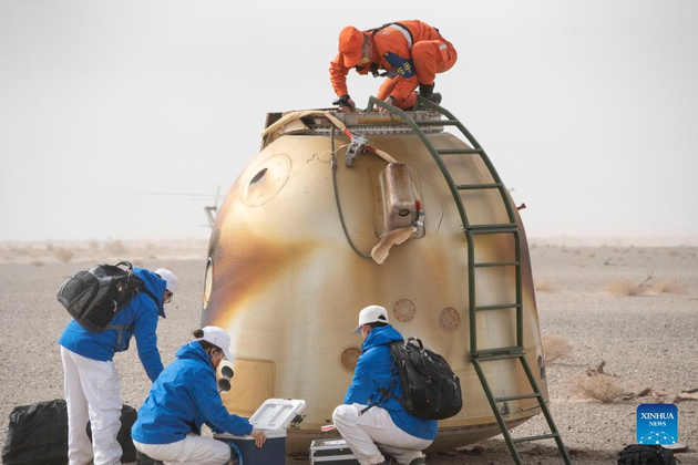 The return capsule of the Shenzhou-13 manned spaceship lands successfully at the Dongfeng landing site in north China's Inner Mongolia Autonomous Region, April 16, 2022. (Xinhua/Cai Yang)