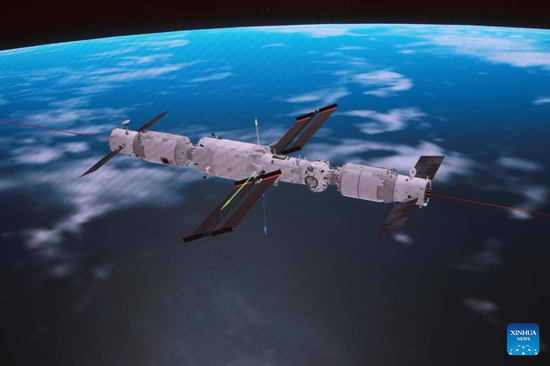 This simulated image captured at Beijing Aerospace Control Center on May 10, 2022 shows China's cargo spacecraft Tianzhou-4 docking with the combination of the space station core module Tianhe and the Tianzhou-3 cargo craft. China's cargo spacecraft Tianzhou-4, carrying supplies for the upcoming Shenzhou-14 crewed mission, successfully docked with the combination of the space station core module Tianhe and the Tianzhou-3 cargo craft on Tuesday, according to the China Manned Space Agency. (Xinhua/Guo Zhongzheng)