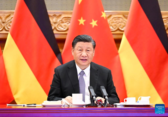 Chinese President Xi Jinping meets via video link with German Chancellor Olaf Scholz in Beijing, capital of China, May 9, 2022. (Xinhua/Li Xueren)