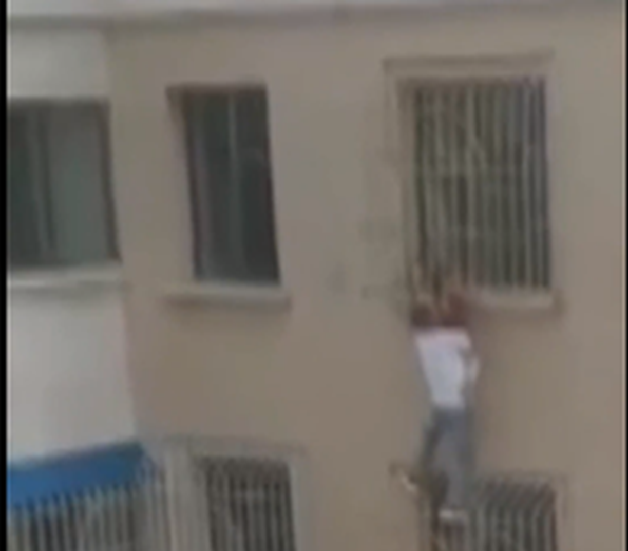 Brave neighbor saves girl stuck in 6th story window