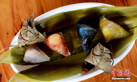 Villagers make Zongzi to greet upcoming Dragon Boat Festival in Guangxi