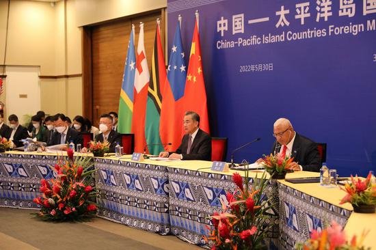 Chinese State Councilor and Foreign Minister Wang Yi co-host the second China-Pacific Island Countries Foreign Ministers' Meeting with Fijian Prime Minister and Foreign Minister Josaia Voreqe Bainimarama in Suva, capital of Fiji, May 30, 2022. (Xinhua/Zhang Yongxing)