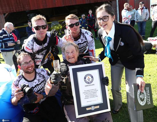 Swedish woman breaks world record for double skydiving
