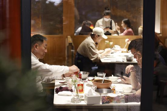 Restaurants resume dine-in service after over month long suspension in Beijing