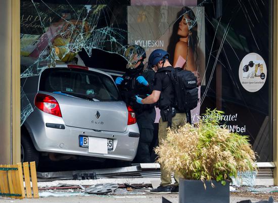 At least 1 dead as car plows into crowd in Berlin