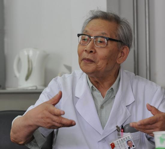 Xin Yuling at his office in the China-Japan Friendship Hospital in Beijing. (Photo provided to China Daily)