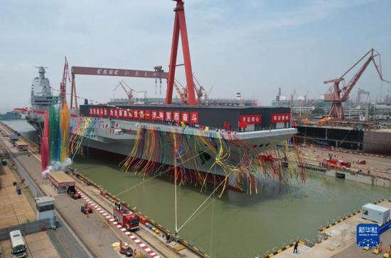 Photo taken on June 17, 2022 shows the launching ceremony of China's third aircraft carrier, the Fujian, in east China's Shanghai. The carrier, named after Fujian Province, was completely designed and built by the country. (Photo/Xinhua)