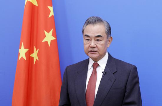Wang Yi: China is committed to promoting global development