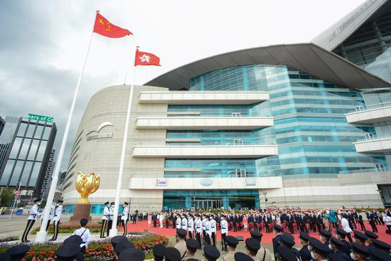 A flag-raising ceremony is held by the government of the Hong Kong Special Administrative Region to celebrate the 25th anniversary of Hong Kong's return to the motherland, at the Golden Bauhinia Square in Hong Kong, south China, July 1, 2022. (Xinhua)

