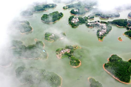 Islands add charm to enchanting Tunliu Reservoir in Guangxi