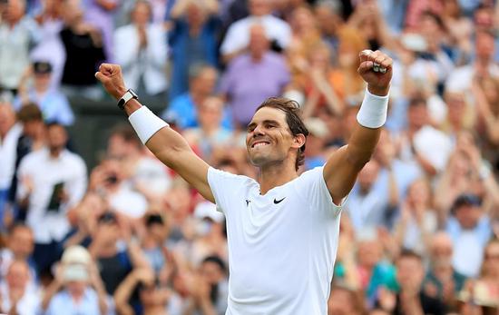 Rafael Nadal of Spain celebrates after winning the men's singles quarter-final match against Taylor Fritz of the United States at Wimbledon Tennis Championship in London, Britain, on July 6, 2022. (Xinhua/Li Ying)
