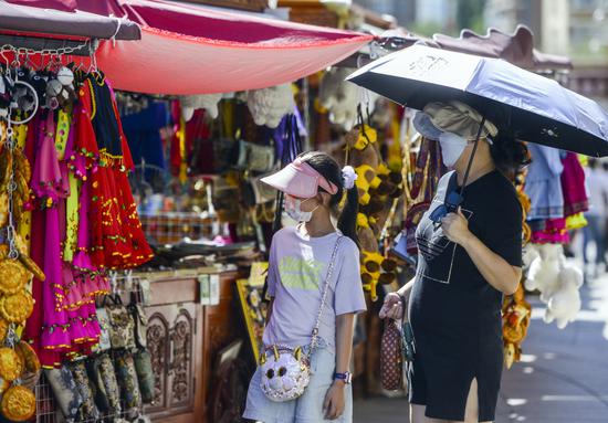 Xinjiang welcomes summer travel peak