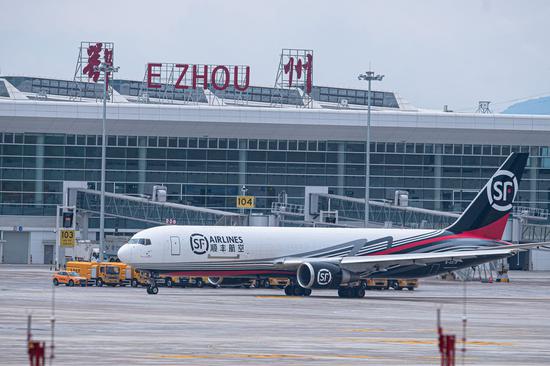 A cargo plane taxies at the Ezhou Huahu Airport in Ezhou, central China's Hubei Province, July 17, 2022.  (Xinhua/Xiao Yijiu)